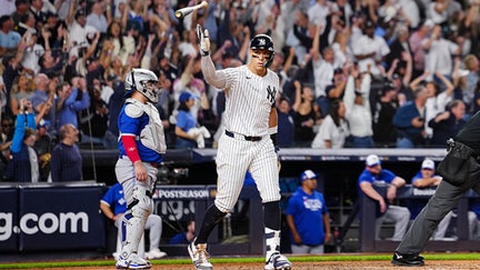 Aaron Judge #99 of the New York Yankees reacts after hitting a game-tying three-run home run in the fourth inning of Game Three of the American League Division Series presented by Booking.com between the Toronto Blue Jays and the New York Yankees at Yankee Stadium on Tuesday, October 7, 2025 in New York, New York. - Fox Business News