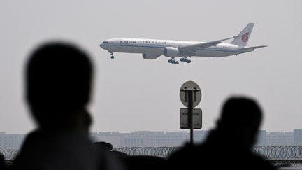 An Air China Boeing 777-300 plane lands at Beijing International airport on April 10, 2025. - Fox Business News