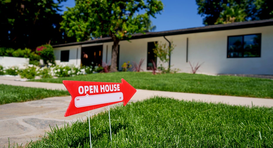 Open house sign near single-family home