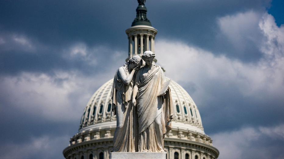 The Peace Monument in front of the U.S. Capitol dome