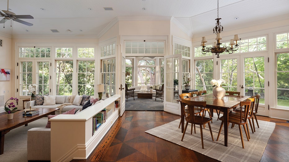Connected to the kitchen area in an informal restaurant, family room and sunroom.