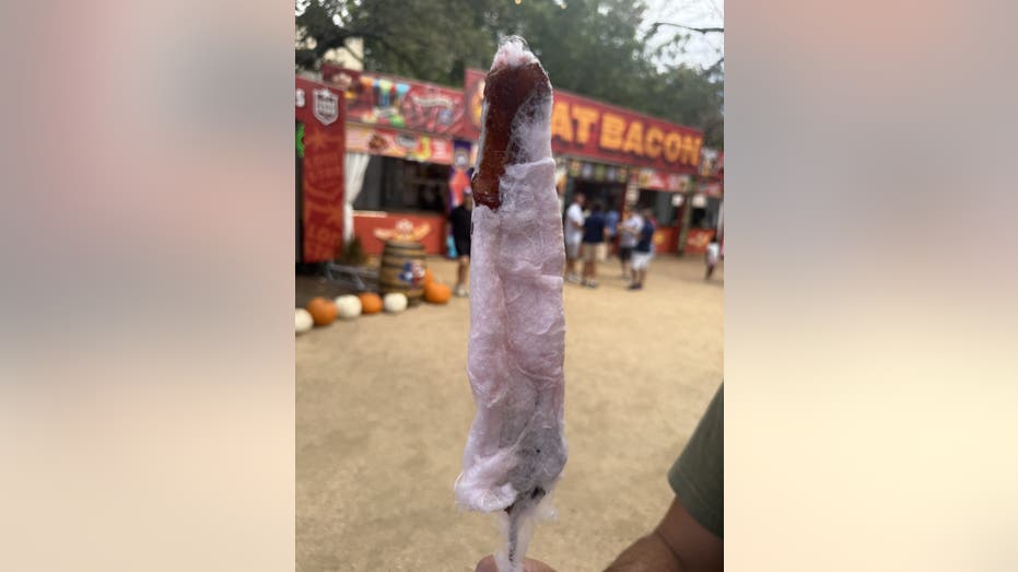 Bacon wrapped in cotton candy on a stick.
