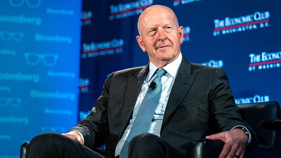 Goldman Sachs CEO David Solomon speaks during an Economic Club of Washington event, discussing U.S. market stability and corporate failures.