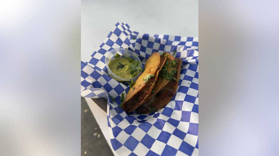 Deep-fried tacos in a basket.