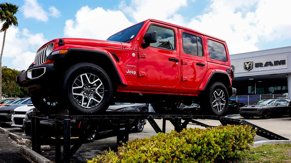 A new Jeep Wrangler 4-Door Sahara displayed for sale at a Stellantis NV dealership in Florida.