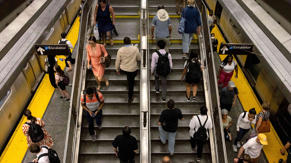 NYC commuters on a metro