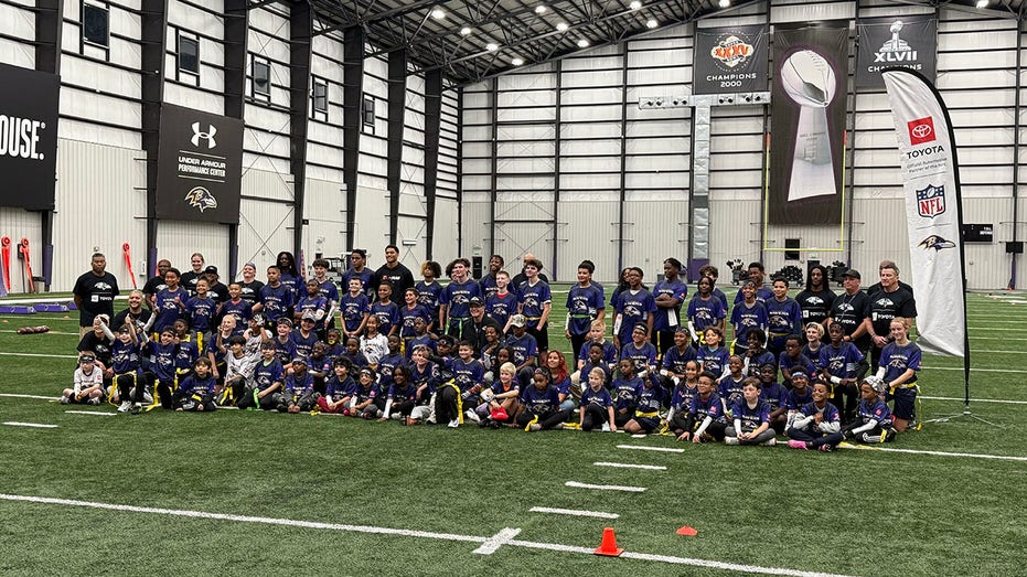 NFL FLAG clinic kids with Kyle Hamilton