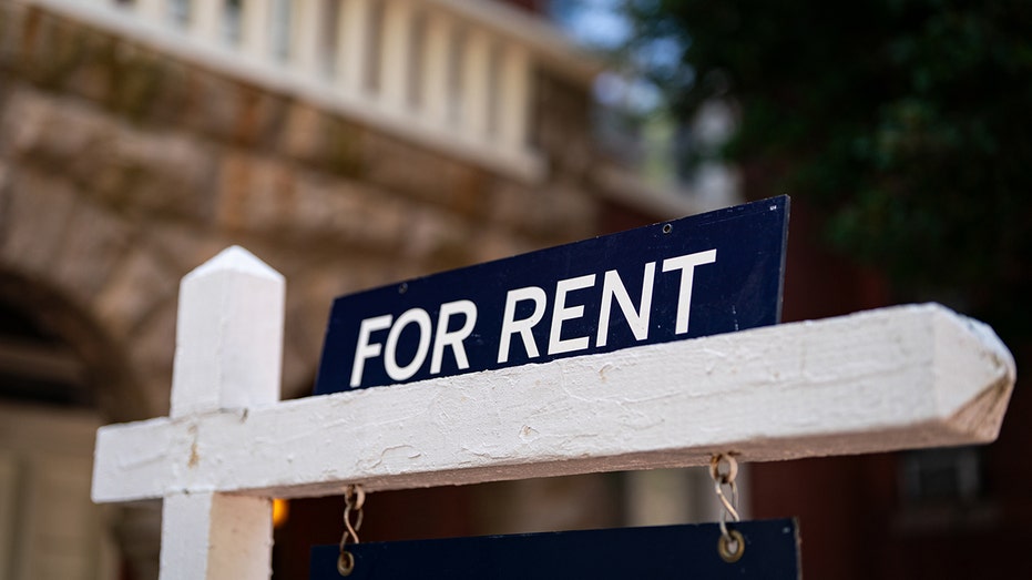 A "For Rent" sign in front of a building in the Capitol Hill neighborhood.