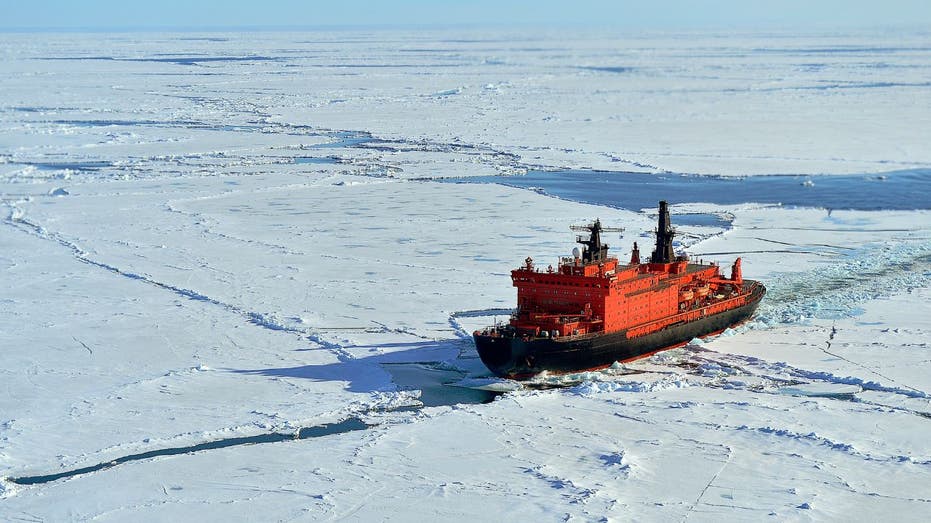 Russian icebreaker sailing through Arctic sea ice toward the North Pole.