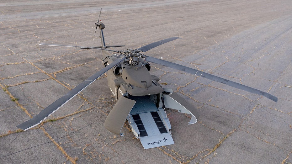 A Sikorsky U-Hawk with its clamshell cargo door open