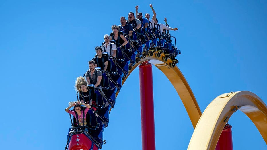 Six Flags goers on a roller coaster