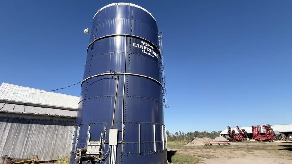 Blue grain storage bin on southern Illinois farm.