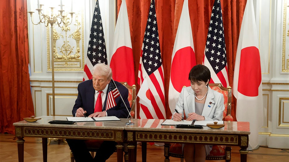 trump and sanae takaichi signing ceremony
