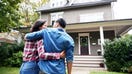 A couple walks up to the front of their home. - Fox Business News