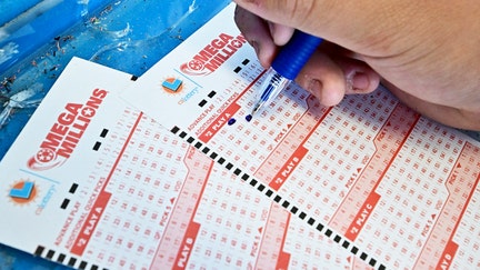 Numbers on tickets for the Mega Millions lottery are selected by a purchaser in Los Angeles, California, on Aug. 4, 2023. - Fox Business News