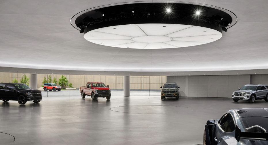 Ford models in the showroom at the company's world headquarters.