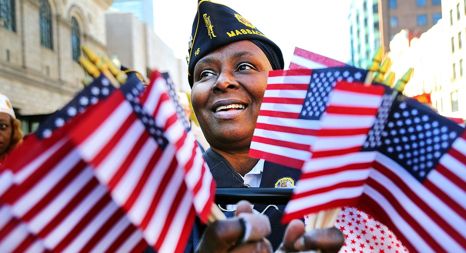 US veterans holds American flags