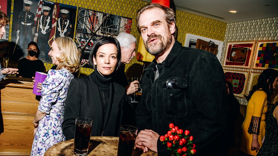 Lily Allen and David Harbour smiling