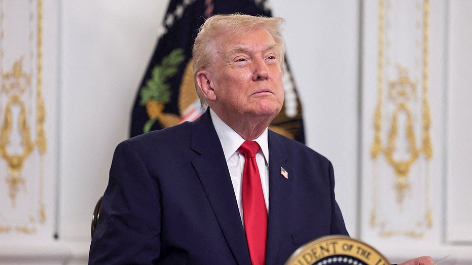 President Donald Trump speaks to service members