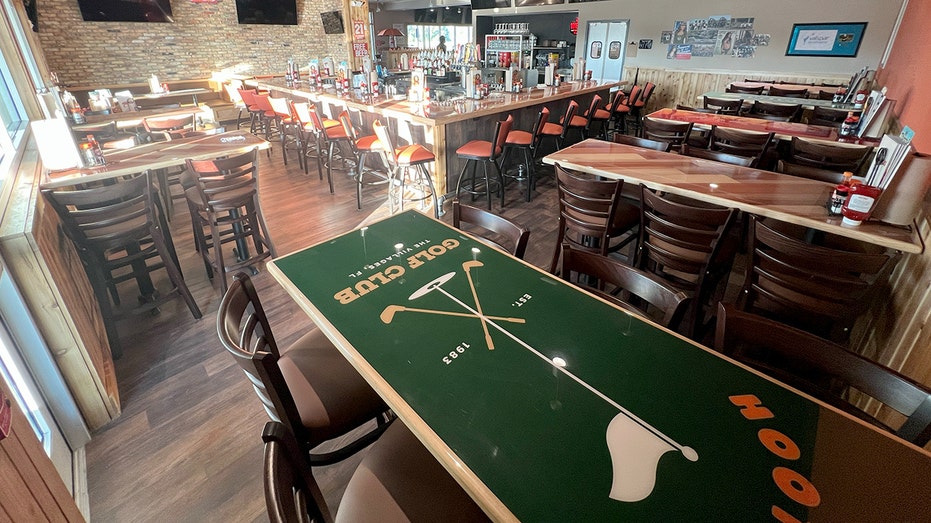 Inside of a revamped Hooters restaurant.