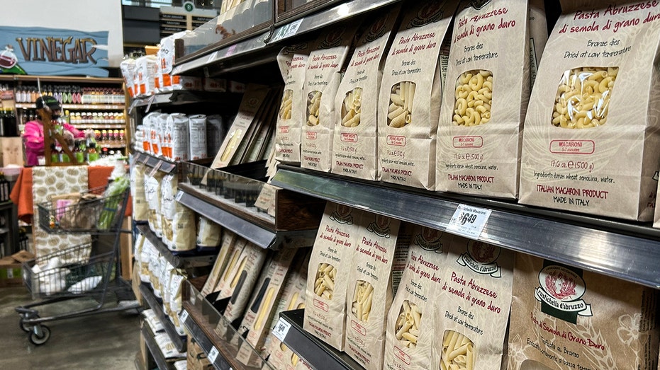 Imported Italian pastas on shelves at market