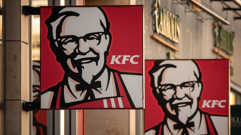 The sun shines on the logo of the founder of the Kentucky Fried Chicken Chain.