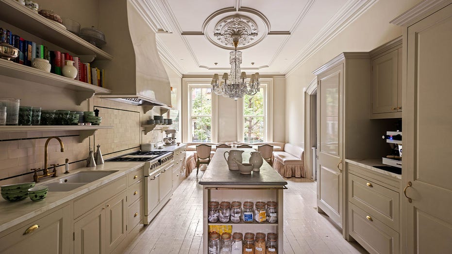 The stunning kitchen features lots of storage space