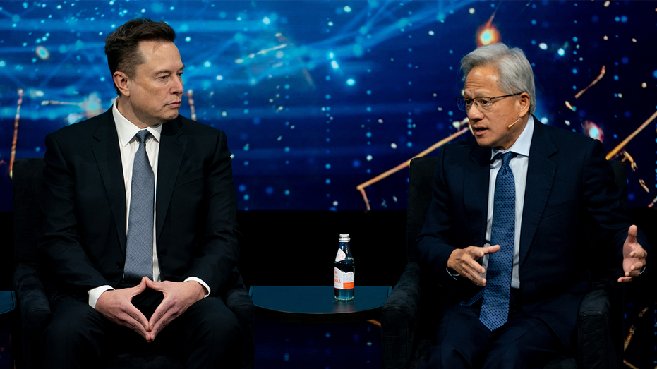 musk-huang-forum Jensen Huang joins Musk at forum where Tesla CEO predicts money irrelevant