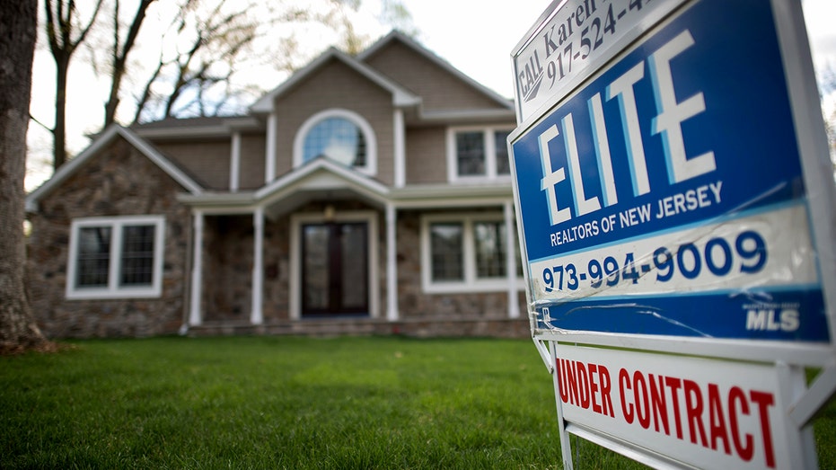 A "For Sale" sign is outside of a house in Oradell, New Jersey.