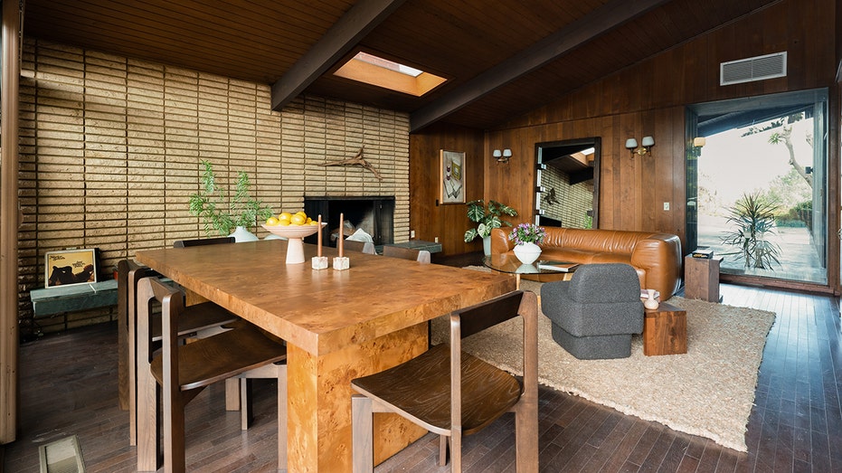 The home also features a combined living and dining room with a skylight and a fireplace.