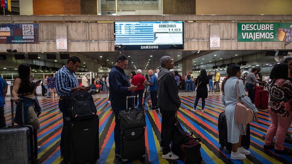Passengers at Caracas' Simon Bolivar airport in Venezuela