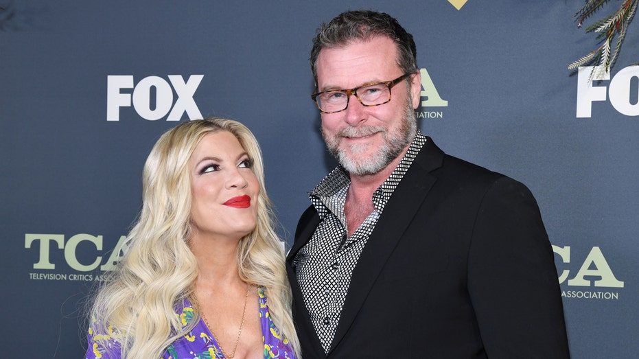 Tori Spelling and Dean McDermott attend an event in 2019