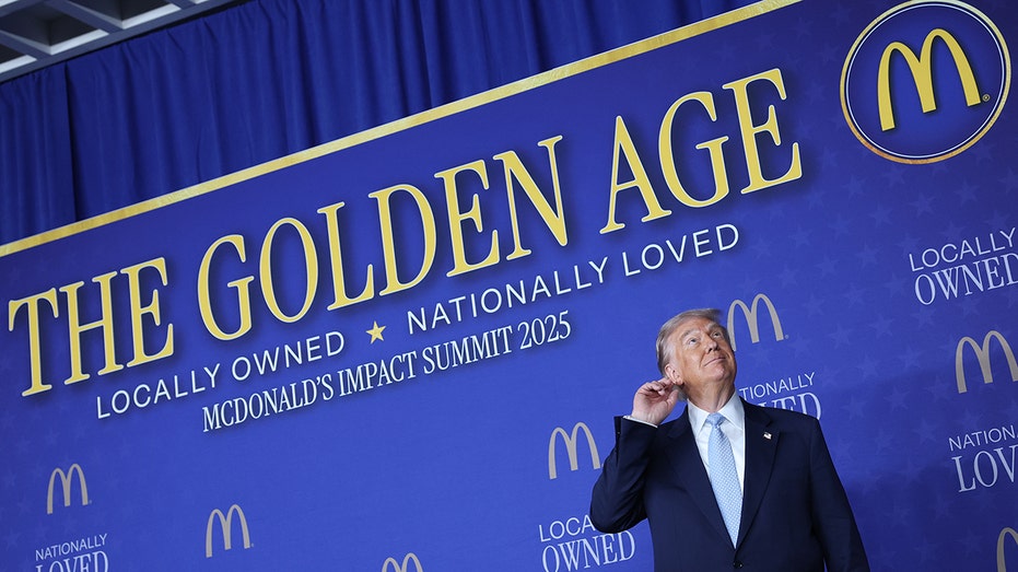President Donald Trump arrives to deliver remarks at the McDonald’s Impact Summit.