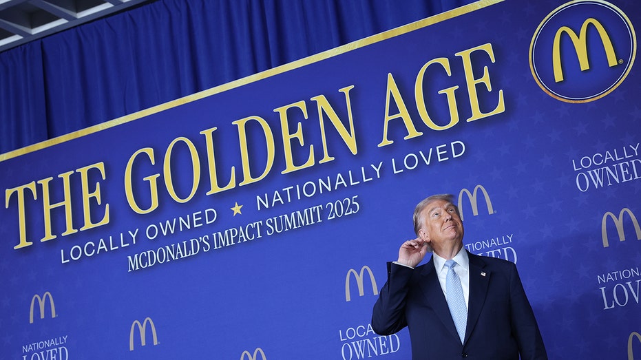 President Donald Trump arrives to deliver remarks at the McDonald’s Impact Summit.