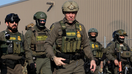 Gregory Bovino, the chief U.S. Border Patrol agent, center, leads several federal agents toward protesters as dozens of protesters clash with federal agents and Illinois State police near the U.S. Immigration and Customs Enforcement holding facility in Broadview, Illinois, on Oct. 3, 2025. - Fox Business News