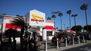 A plane flies over an In-N-Out Burger outlet in Los Angeles, California, U.S., May 7, 2025.  - Fox Business News