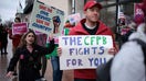 WASHINGTON, DC - MARCH 24: Activists participate in a rally outside the Consumer Financial Protection Bureau (CFPB) on March 24, 2025 in Washington, DC. Activists held a rally to support federal workers affected by DOGE cuts. (Photo by Alex Wong/Getty Images) - Fox Business News