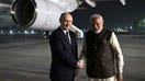 Indian Prime Minister Narendra Modi welcomes Russian President Vladimir Putin at Palam Air Base, in New Delhi, India on December 4, 2025. (Photo by Kremlin Press Service/Anadolu via Getty Images) - Fox Business News