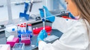 A scientist works in a laboratory handling medication. - Fox Business News