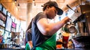 A barista pours steamed milk into a beverage inside a Starbucks Corp. cafe in the Sandton area of Johannesburg, South Africa, on Monday, Jan. 14, 2019. While South Africa's economy emerged from a recession in the third quarter, growth remains sluggish, hampered by subdued business confidence, higher taxes imposed by the government in February and a tight monetary-policy stance. Photographer: Waldo Swiegers/Bloomberg via Getty Images - Fox Business News