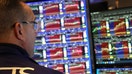 NYSE Trader monitoring U.S. stock benchmarks after several economic reports.  - Fox Business News