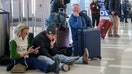 Travelers at LaGuardia Airport (LGA) in the Queens borough of New York, US, on Friday, Dec. 26, 2025. Hundreds of flights have been canceled at New York's major airports as a significant winter storm descends on the city and neighboring regions, with New York City in line to get 5 to 9 inches (13 to 23 cm) of snow between 4 pm Friday and 1 pm Saturday, according to the National Weather Service.  - Fox Business News