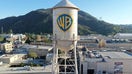 BURBANK, CALIFORNIA - DECEMBER 05: An aerial view of the Warner Bros. logo displayed on the water tower at Warner Bros. Studio on December 5, 2025 in Burbank, California. Netflix and Warner Bros. Discovery, Inc. have announced an $82.7 billion deal for Netflix to acquire Warner Bros. film and TV studios, HBO Max, and HBO.  (Photo by Mario Tama/Getty Images) - Fox Business News