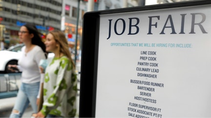 Signage for a job fair is seen on 5th Ave. after the release of the jobs report in Manhattan, New York City, on Sept. 3, 2021. - Fox Business News