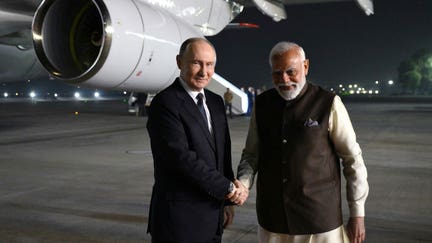 Indian Prime Minister Narendra Modi welcomes Russian President Vladimir Putin at Palam Air Base, in New Delhi, India on December 4, 2025. (Photo by Kremlin Press Service/Anadolu via Getty Images) - Fox Business News