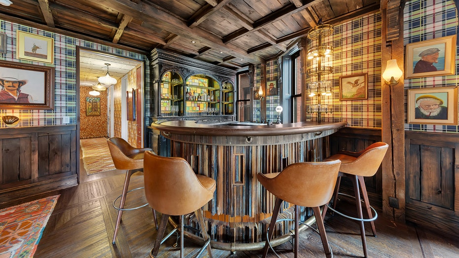 The great room also has a vintage bar with stained glass designs.