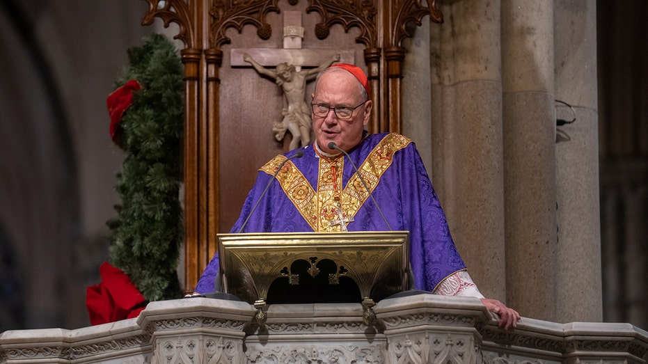 Cardinal Timothy Dolan speaks during mass