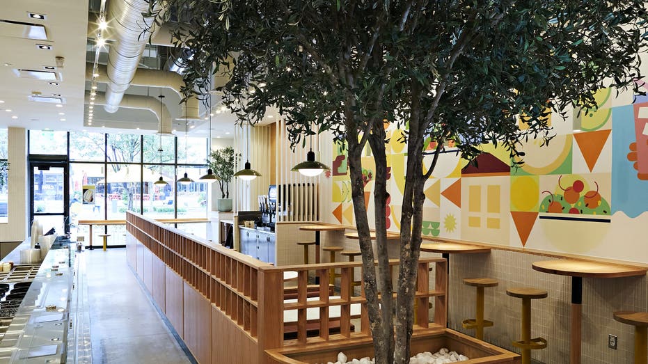 The inside of a Cava restaurant.