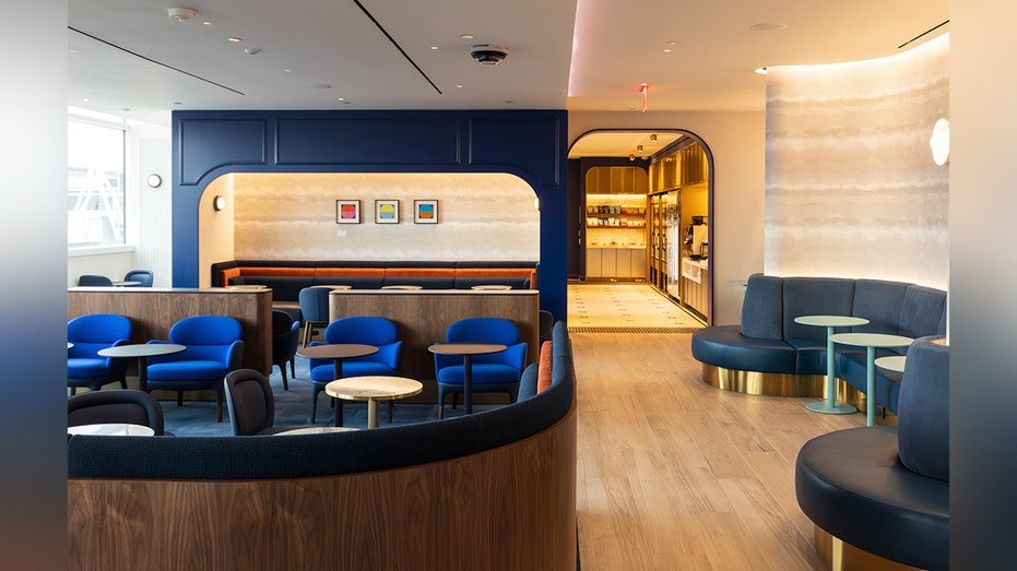 blue furniture and wall airport lounge