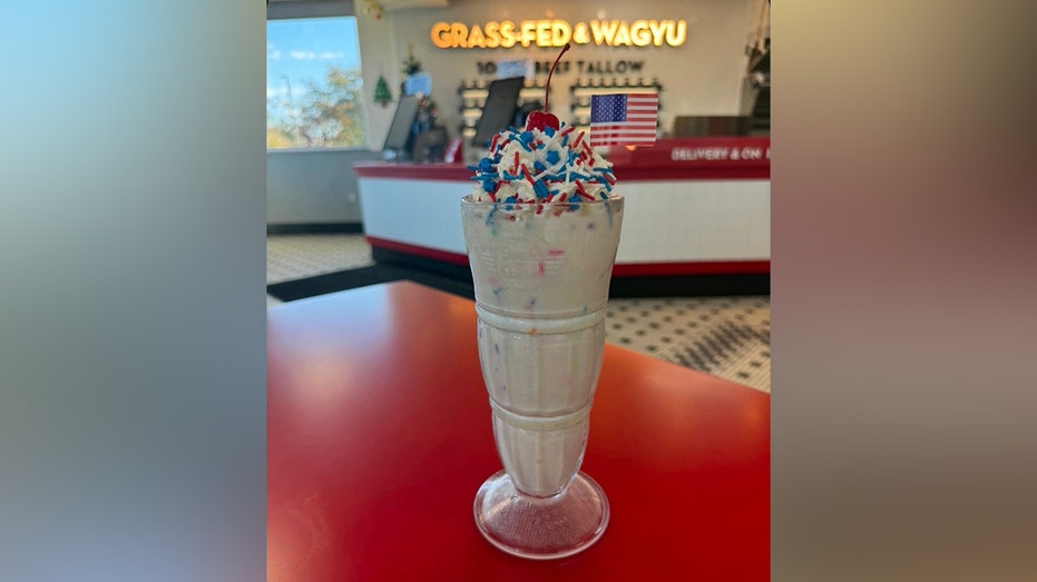 A Steak ’n Shake milkshake topped with red, white and blue sprinkles